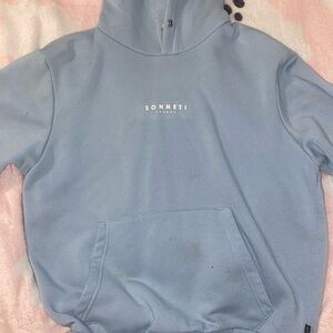 Baby blue “Sonneti” hoodie. Few stains (showed in pictures). Strings are missing